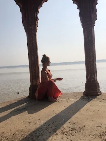 Sunrise ritual by the water
