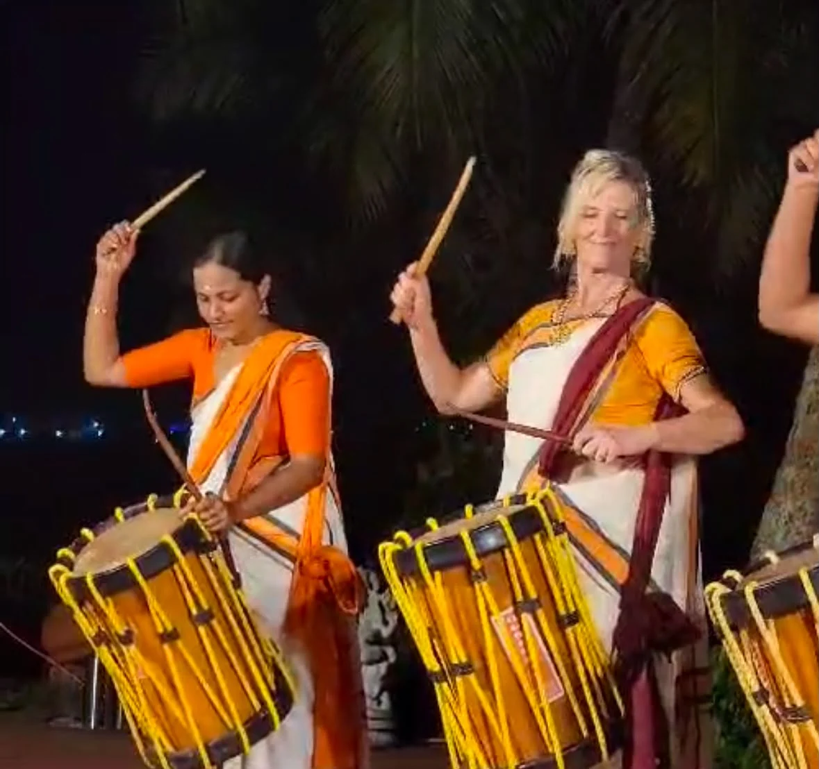 Shiva and women playing drums together
